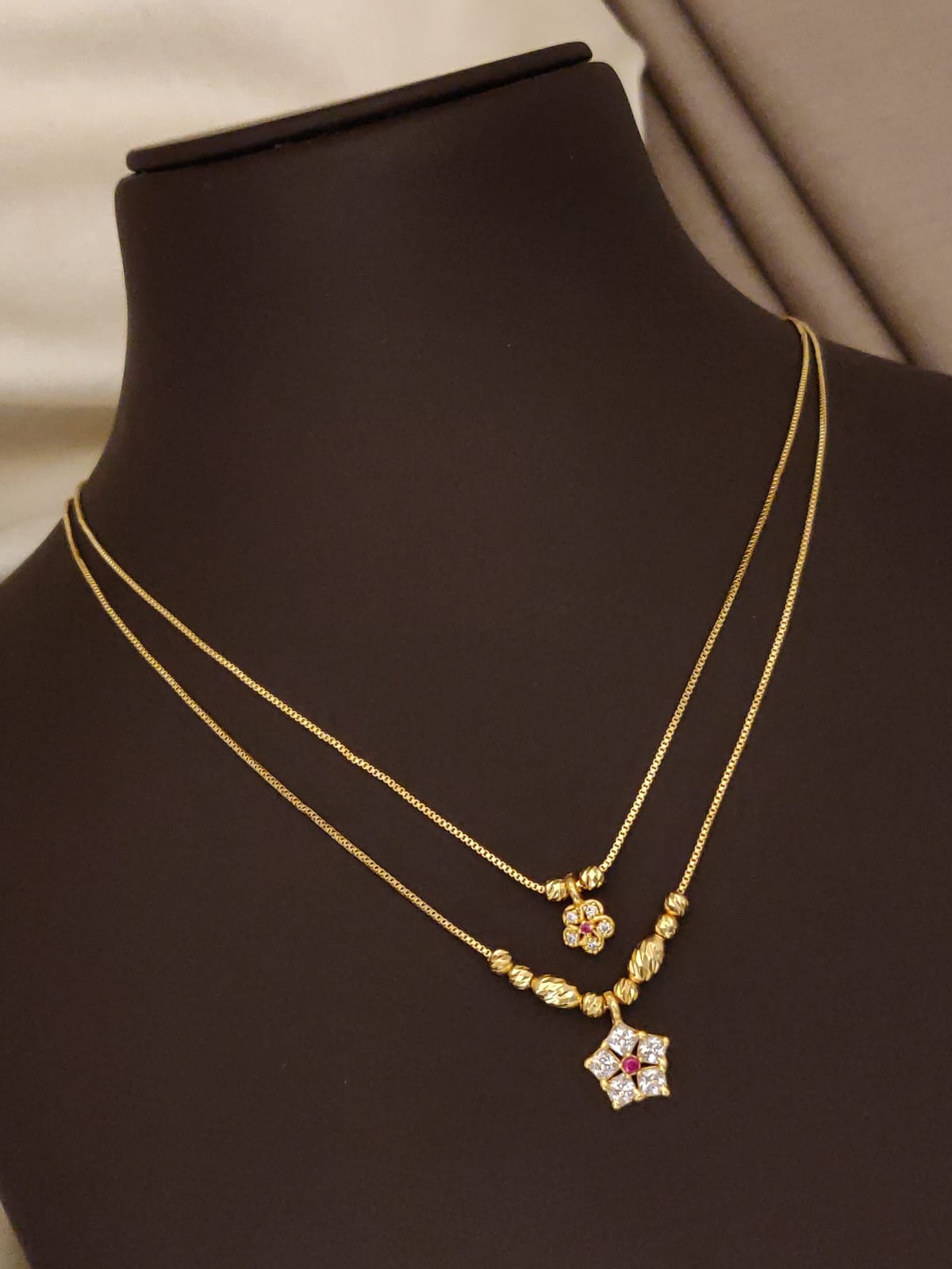 Elegant Dual-Layer Gold Plated Floral & Star Pendant Necklace Set