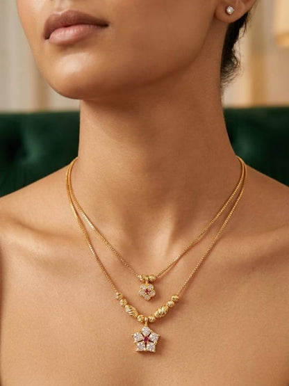 Elegant Dual-Layer Gold Plated Floral & Star Pendant Necklace Set