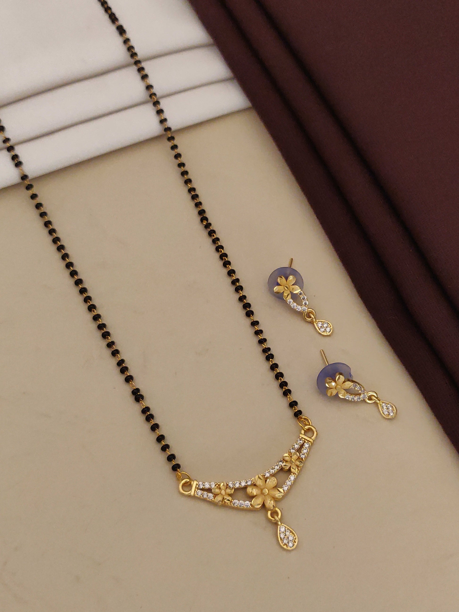 Premium Forming Flower Mangalsutra with And Diamonds And