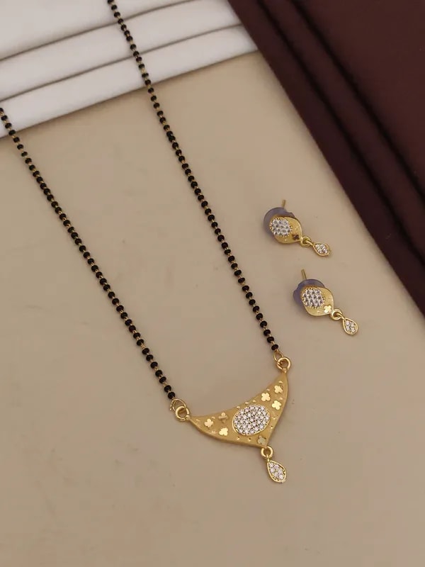Gold Plated And Diamond Studded Forming Mangalsutra with Earrings